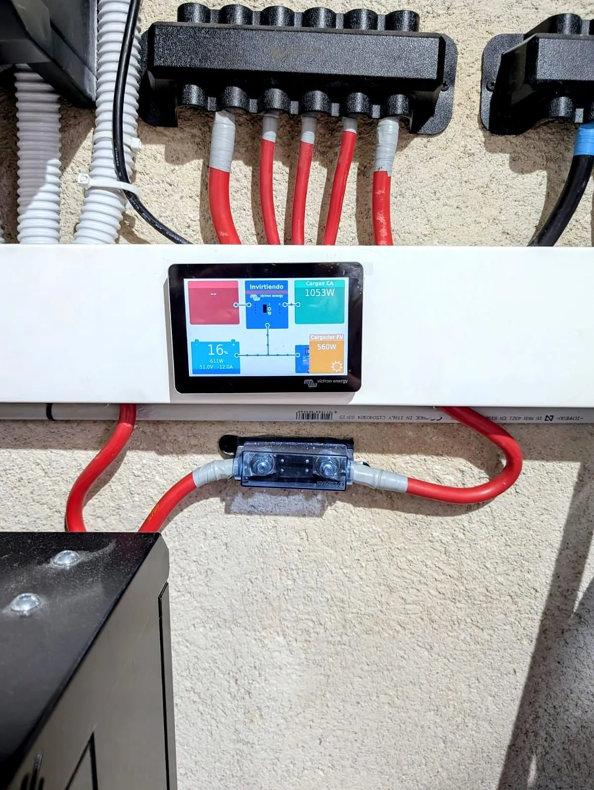 Victron Cerbo GX touch display showing consumption, battery and solar production of an off-grid system